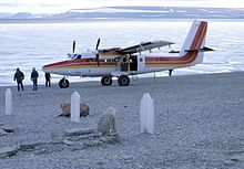 A Twin Otter at Beechey Island visiting the graves of sailors from the lost expedition of John Franklin