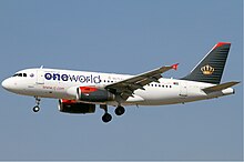 An Airbus A319 in oneworld livery